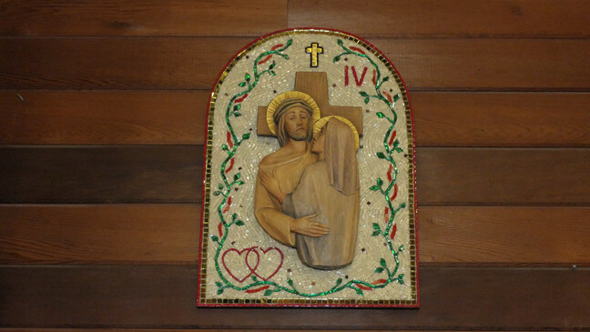 This is an example of one of the wood carvings that has been enhanced with the mosaic background.